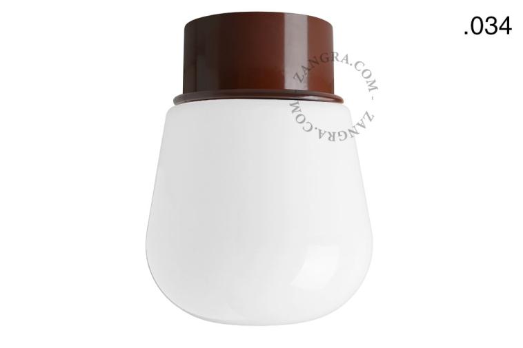 Brown retro ceiling light with glass shade.