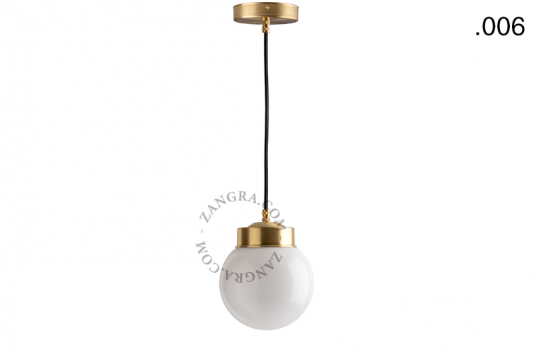 Brass pendant light with glass shade.