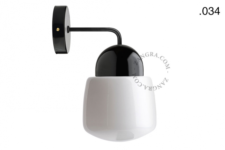 Black porcelain wall light with glass shade.
