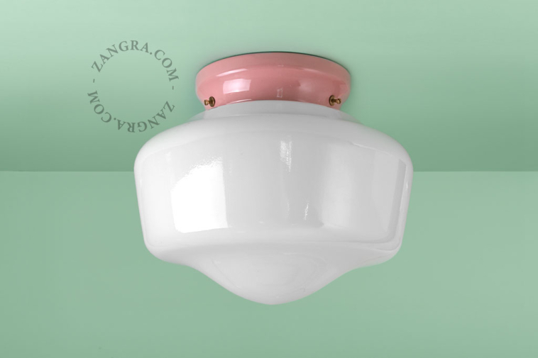 Pink porcelain Art Deco light with glass shade.