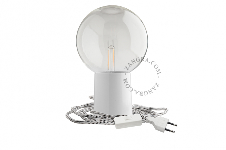 white porcelain table lamp with light bulb