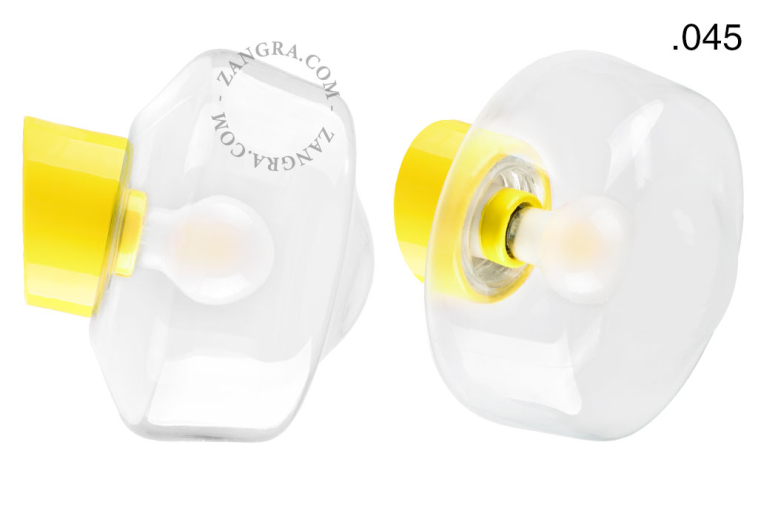 Yellow porcelain wall light with glass lampshade.