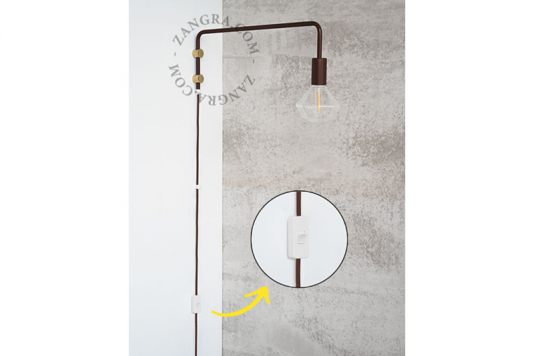 brown wall lamp with swing arm