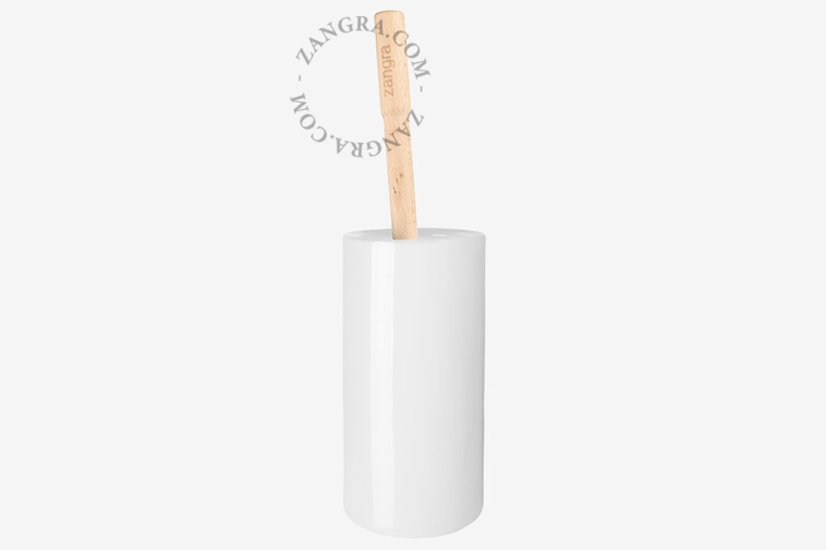 Porte-brosse de toilette en porcelaine blanche.