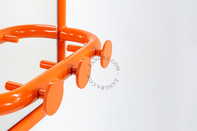 Retro mirror with three hooks.