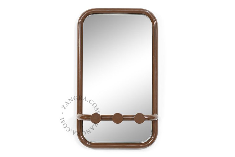 Retro mirror with three hooks.