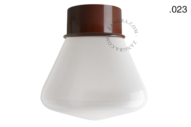 Brown retro ceiling light with glass shade.