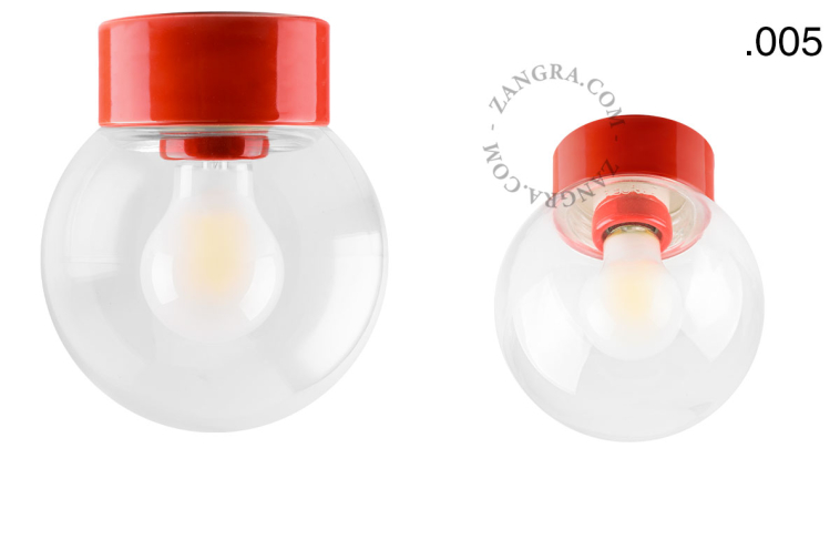 Porseleinen lamp in de kleur rood.