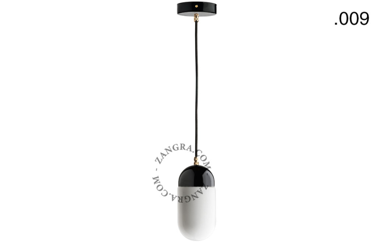 Black porcelain pendant light with glass shade.