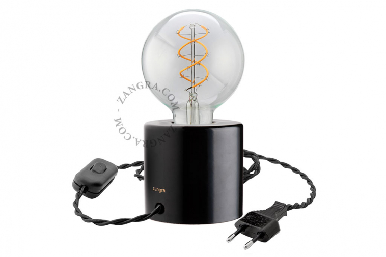 black porcelain table lamp with light bulb