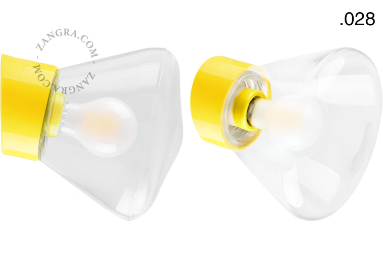 Yellow porcelain wall light with glass lampshade.