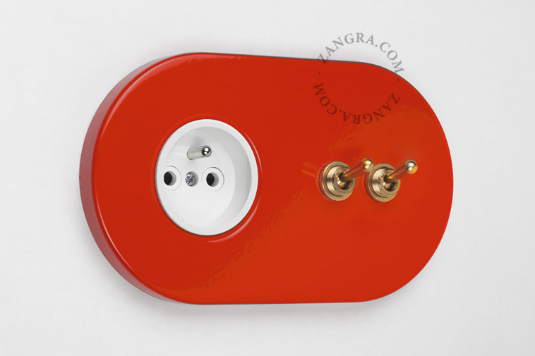 red flush mount outlet & two-way or simple switch – double raw brass toggle