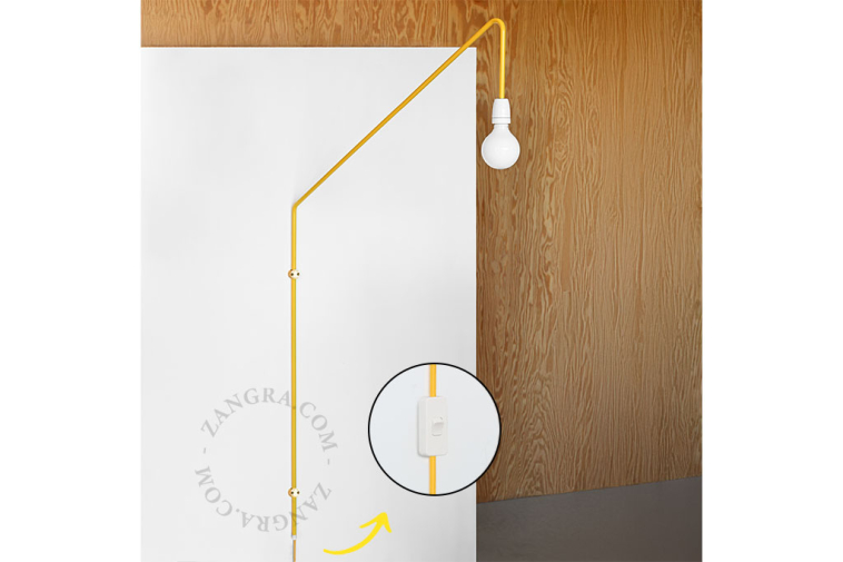 Wall light with swivelling arm.