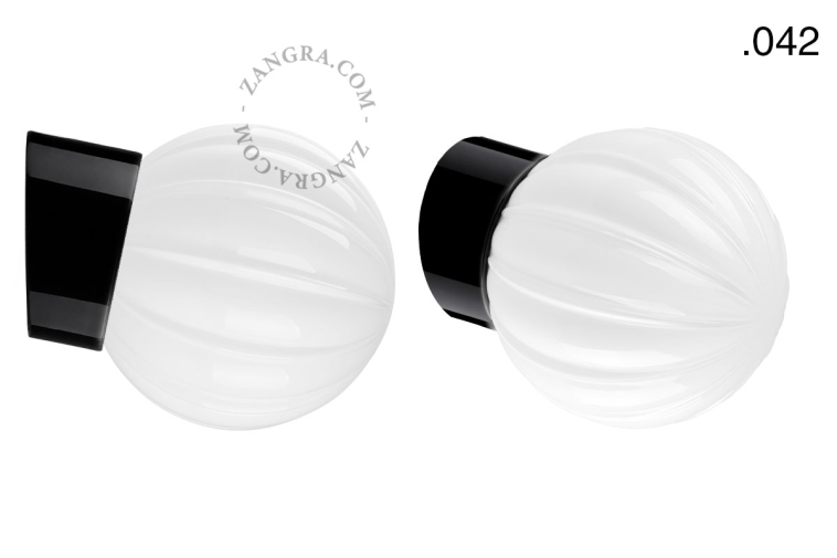 Black porcelain wall light with glass lampshade.
