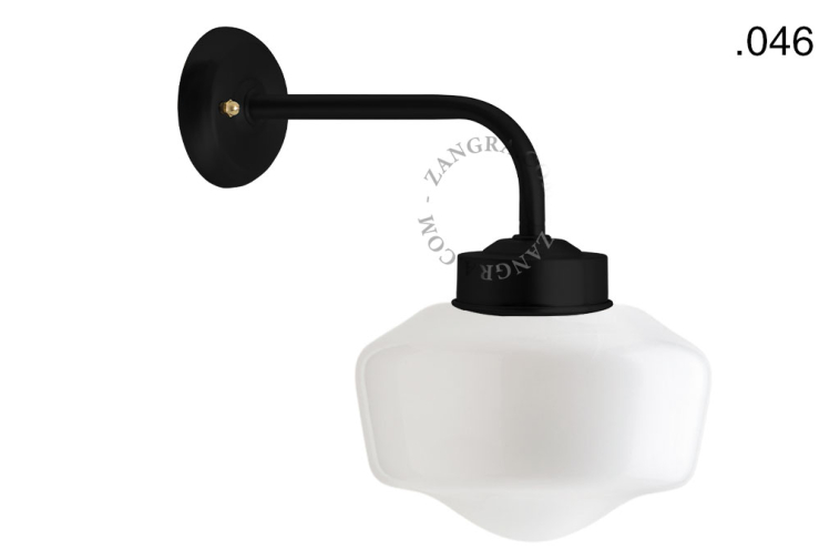 Black retro wall light with glass globe for bathroom or outdoor use.