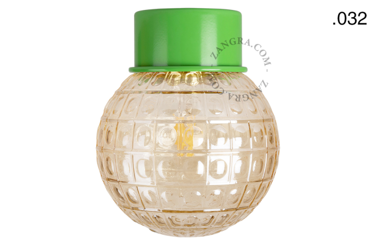 Green ceiling light with glass shade.