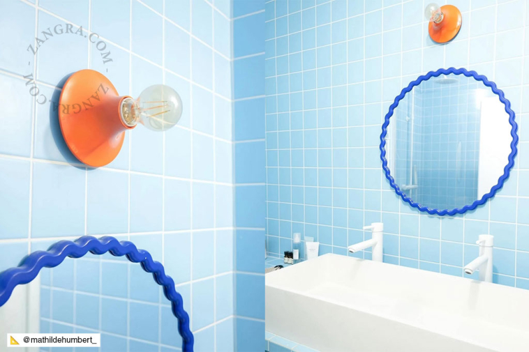 Rund orange lampa.