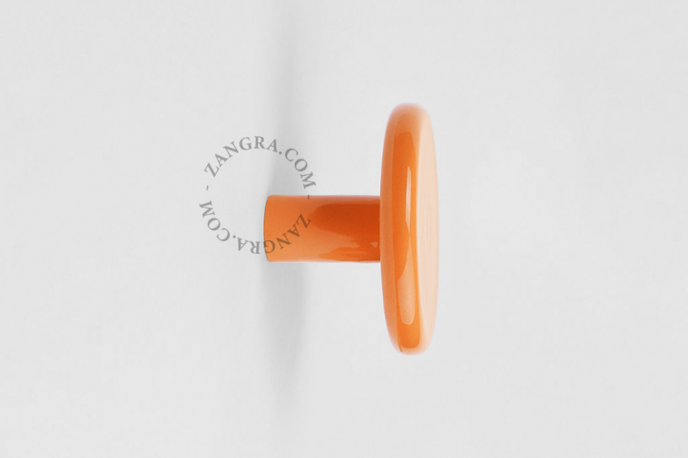 orange porcelain coat hook or door knob
