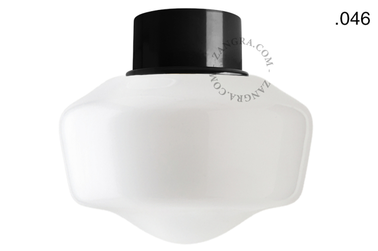 Black ceiling light with glass shade.