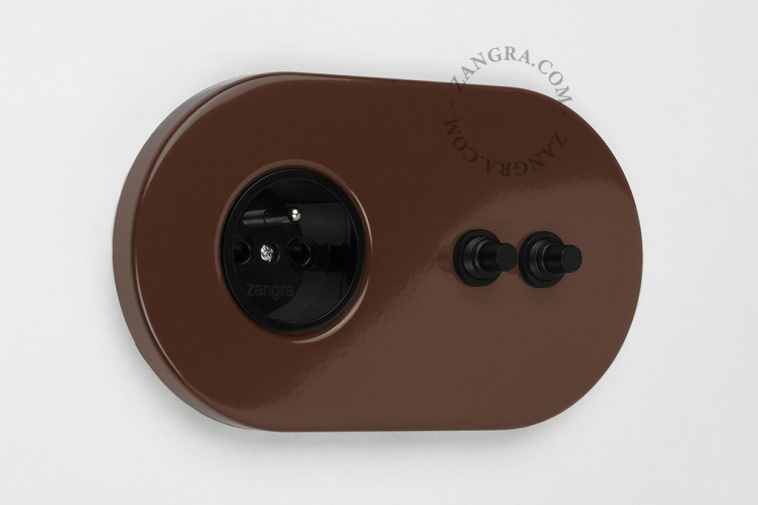 Brown outlet and double pushbutton.
