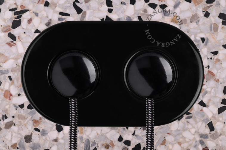 Black porcelain double outlet.