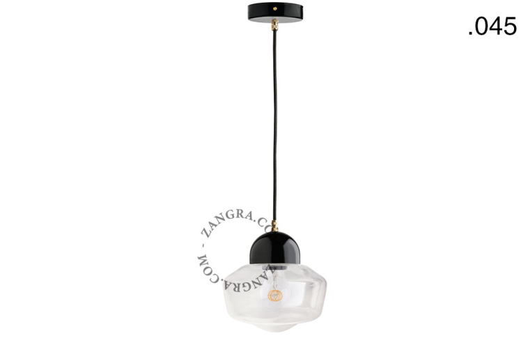 Black porcelain pendant light with glass shade.