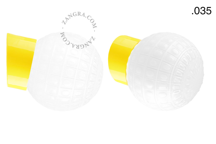 Yellow porcelain wall light with glass lampshade.