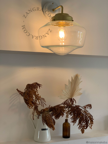 Brass retro wall light schoolhouse style with glass shade.