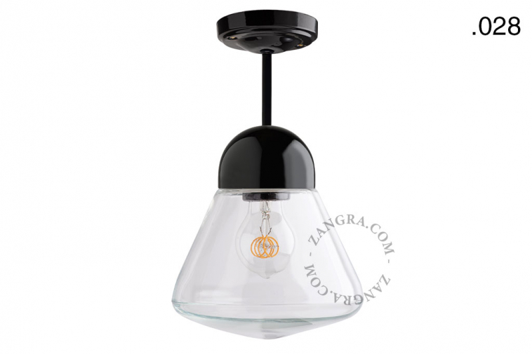 Black porcelain ceiling light with glass shade.