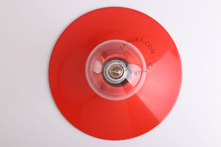 Round red wall or ceiling light.