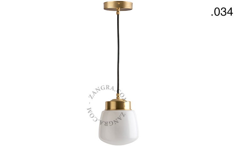 Brass pendant light with glass shade.