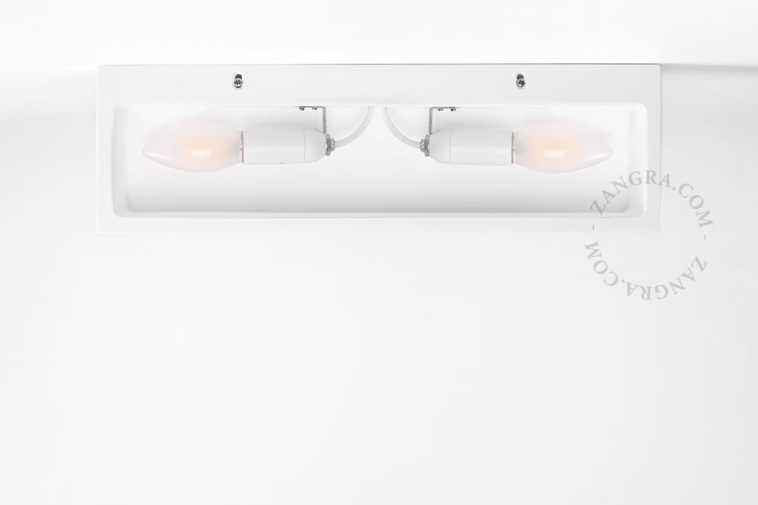 Paintable uplighter in plaster.