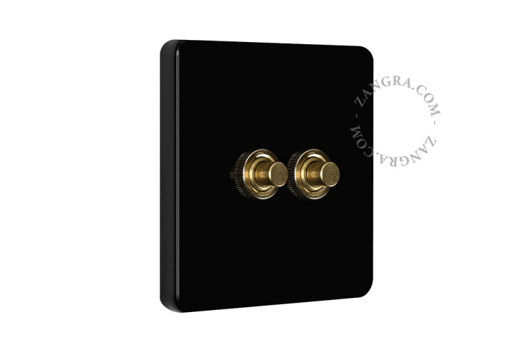 Black porcelain square-shaped push-button.