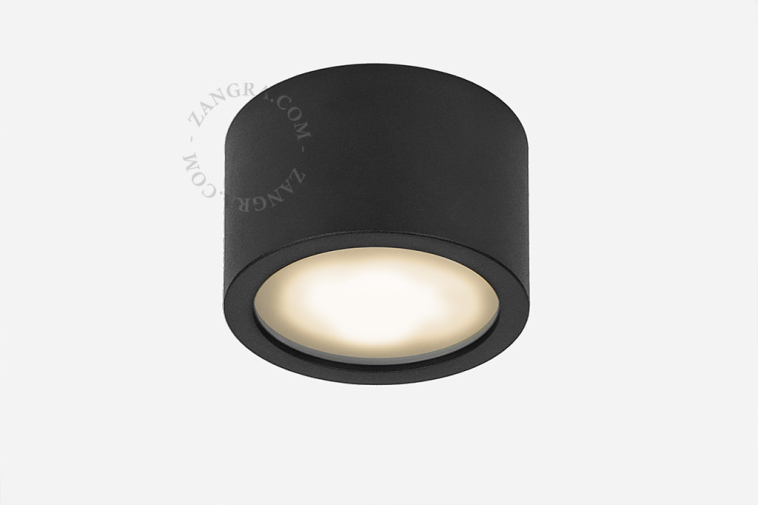 Surface-mounted spotlights for outdoor lighting.