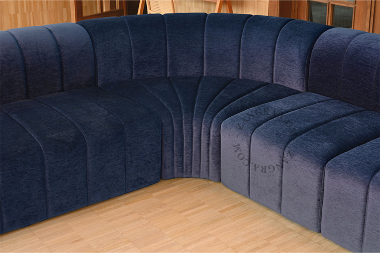 L-shape velvet sofa with chaise longue.