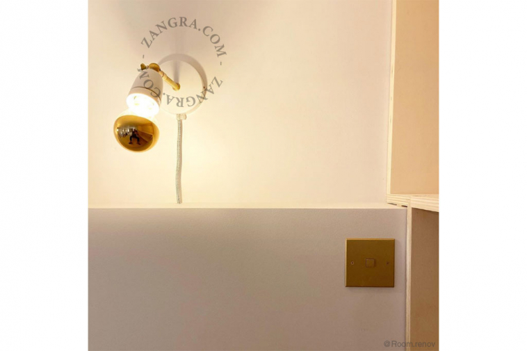 white adjustable wall light with switch