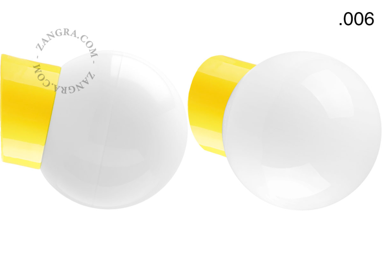 Yellow porcelain wall light with glass lampshade.