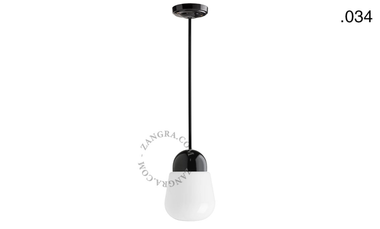 Black porcelain ceiling light with glass shade.