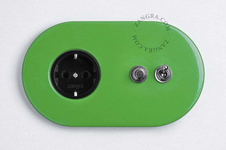 Green outlet & switch with toggle & pushbutton.