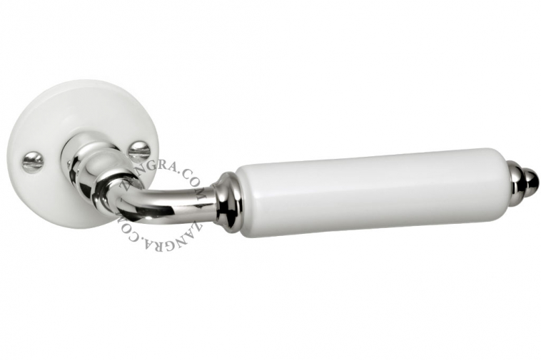 Door handle in white porcelain and silver.