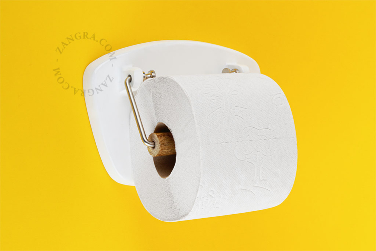 Dérouleur de papier toilette blanc.