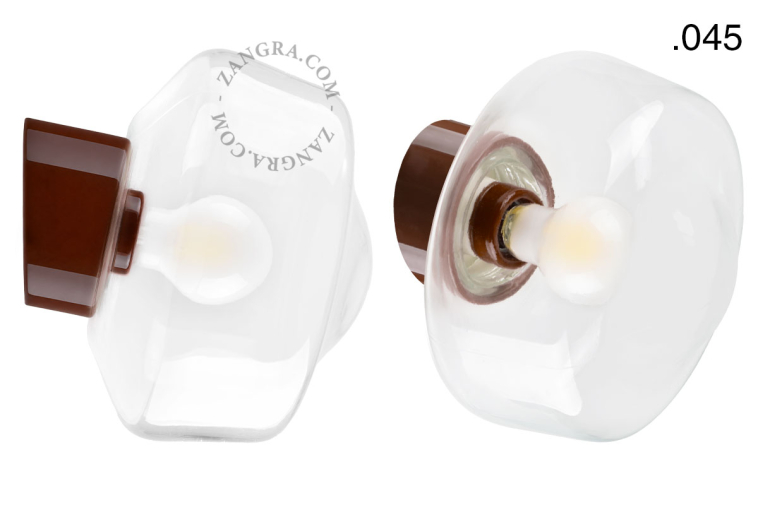 Brown porcelain wall light with glass lampshade.