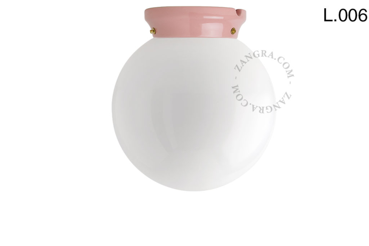 Pink porcelain Art Deco light with glass shade.