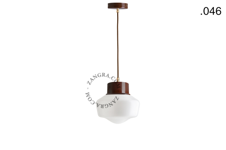 Brown pendant light with glass shade.