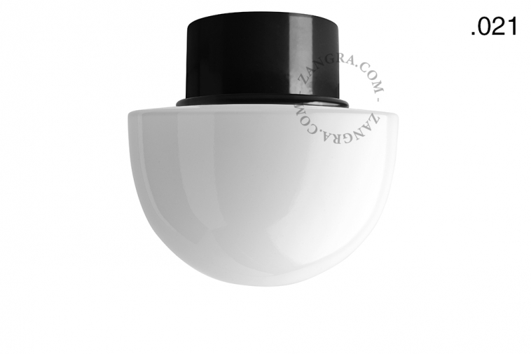 Black ceiling light with glass shade.