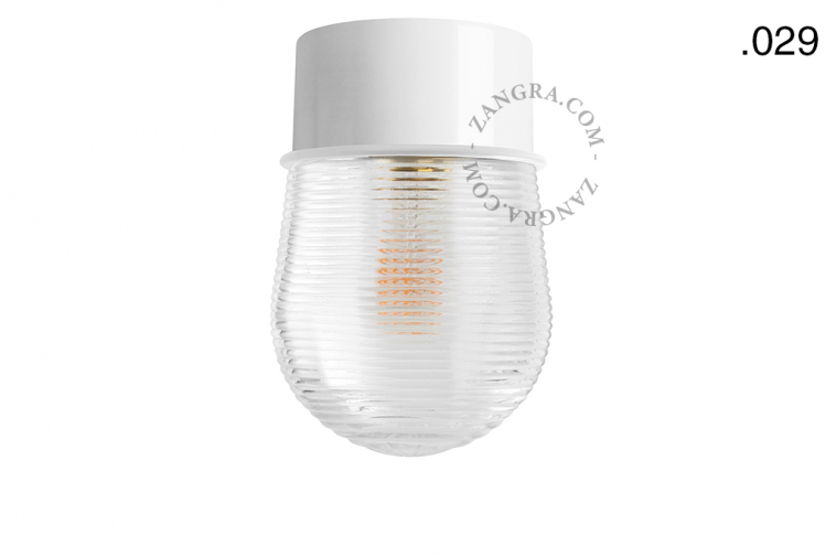White ceiling light with glass shade.