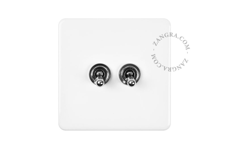 White porcelain square-shaped switch.