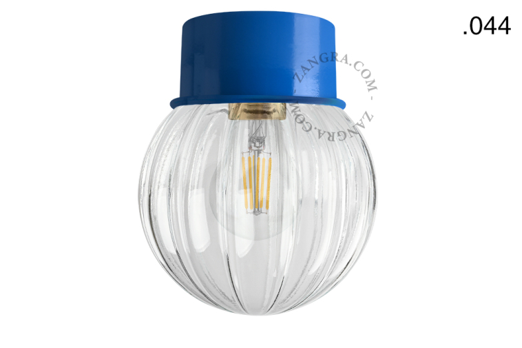 Blue ceiling light with glass shade.