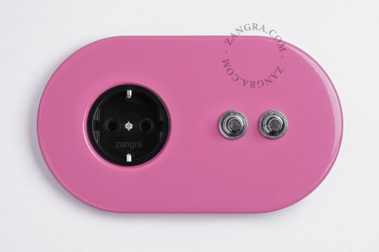 Push-button switch with pink wall outlet | zangra