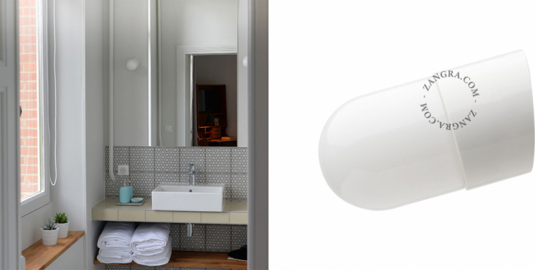 white porcelain wall light with glass shade